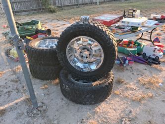 Garage Sale items Chrome Off-Road Wheels with Mud Tires – Set of 4