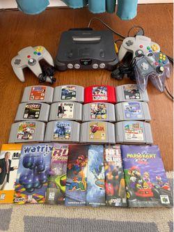 N64 console and games 3 controllers manuals