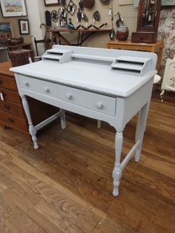 Vintage wooden desk with drawers and cubbies