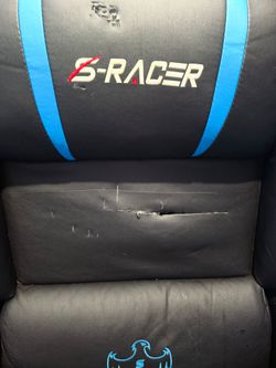 Reclining gaming chair with massage.