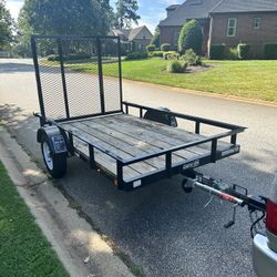 2023/5X8 UTILITY TRAILER WITH TREATED WOODEN FLOOR+ TITLE IN HAND .