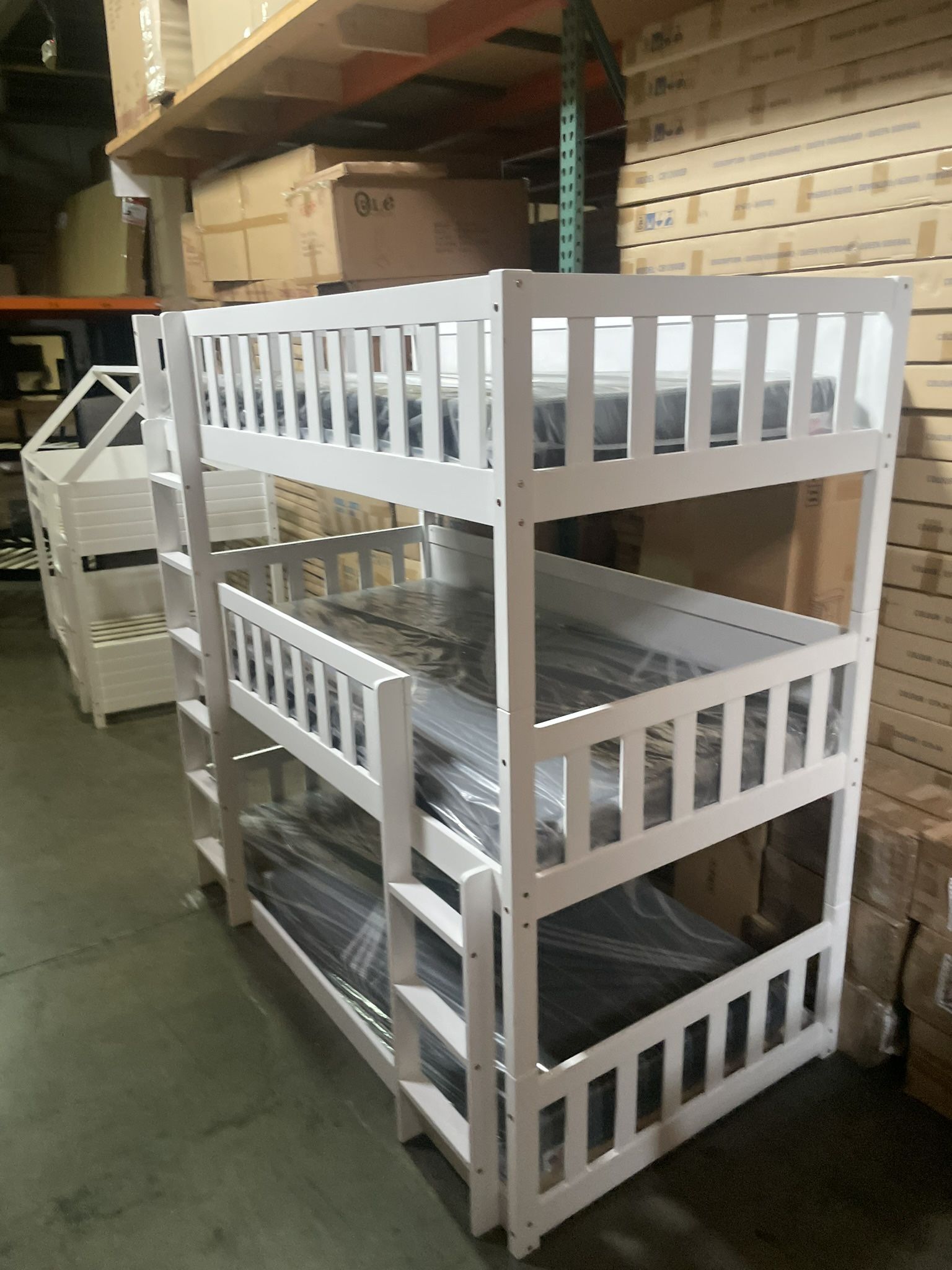 Triple bunk bed. Available in white & espresso. Assembly required. Assembly not included. Taxes included. Free delivery.  Bunk bed only-$450 Bunk bed 