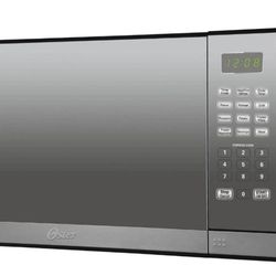 Oster 1.3 Cu. ft. Stainless Steel with Mirror Finish Microwave Oven with Grill