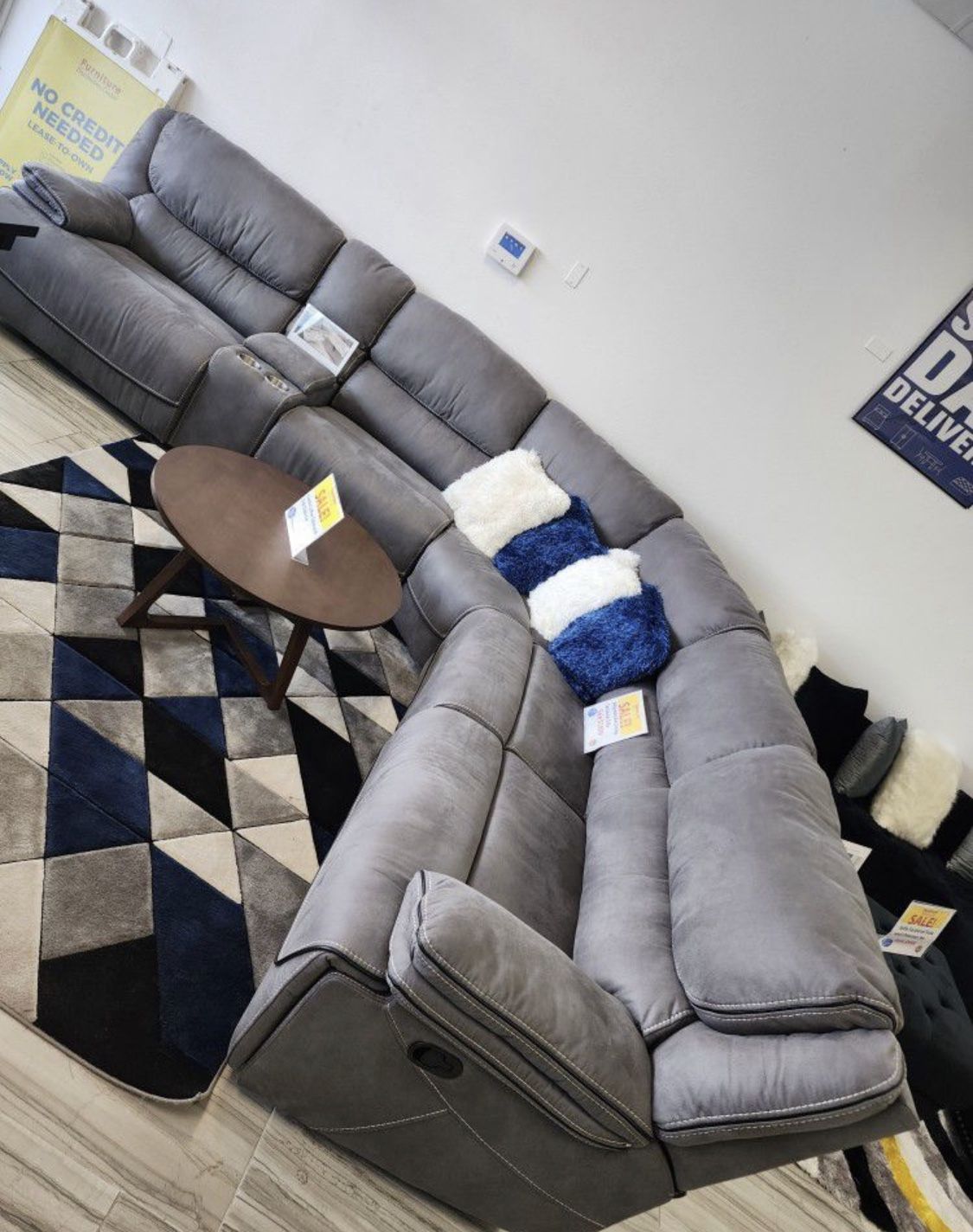 Winter Clearance Sale. Alejandro Gray Modular Reclining Sectional Only $1599. Easy Finance Option. Same-Day Delivery.