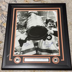 Flyers Autographed Stanley Cup Photo. Professionally Framed. Measures 22x26. Includes COA