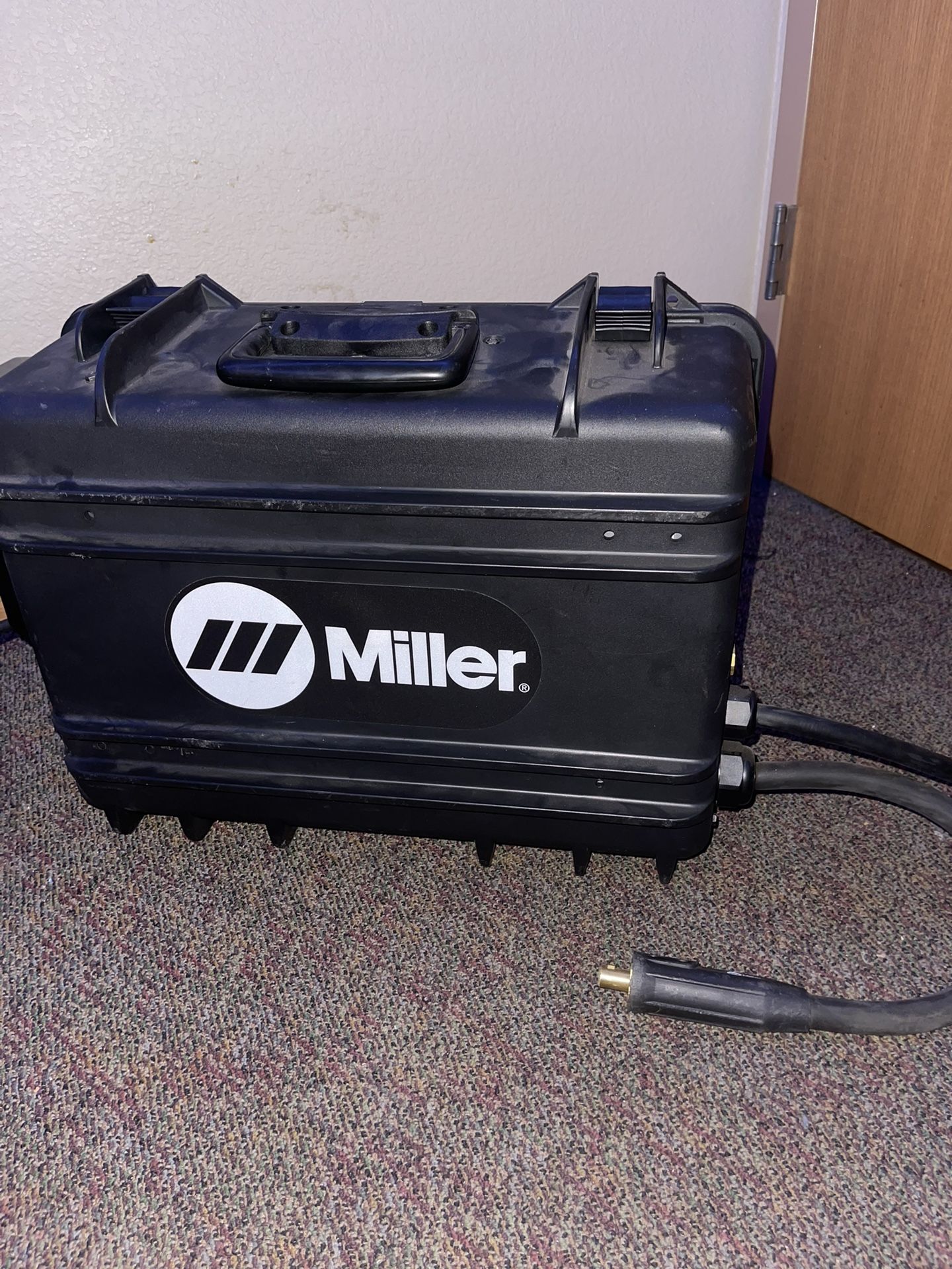 Miller 12Arc Wire Feed Suitcase Welder. 
