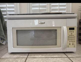 Microwave over stove.