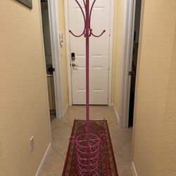 Bright pink coat rack
