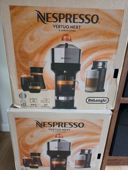 Nespresso Vertuo Next coffee machine paired with an Aeroccino3 milk frother by De'Longhi.