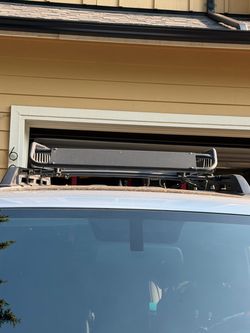 Roof rack with all weather cover