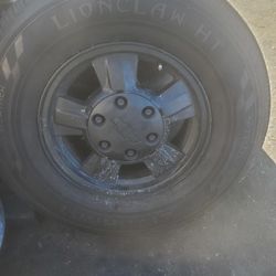  235/75/17 USED tire and rim 
