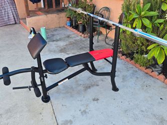 Weider Weight Bench with Barbell