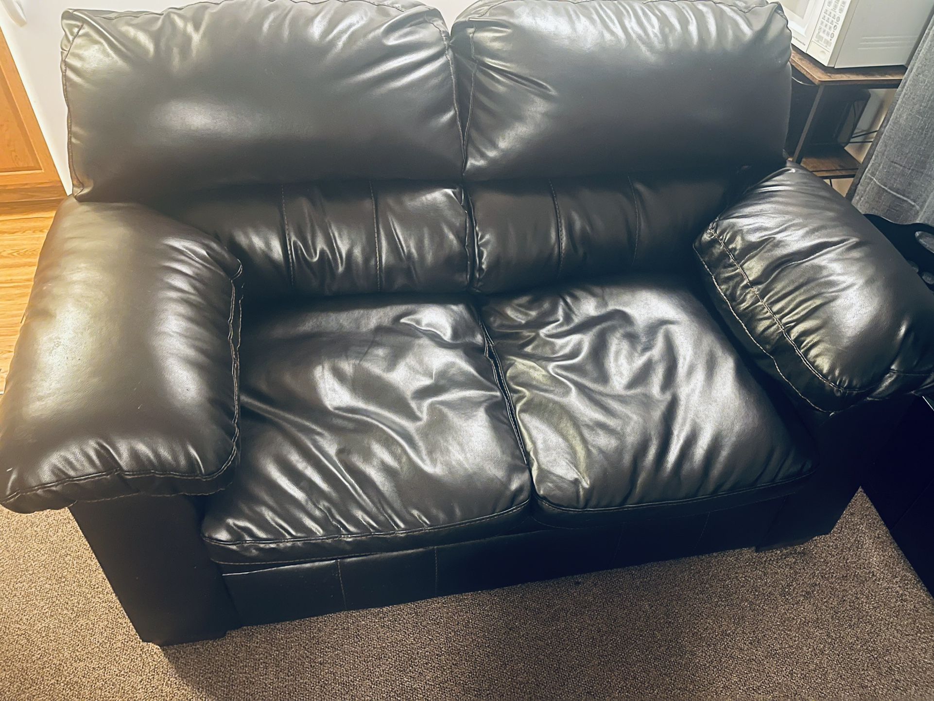 Brown Couch & Black Coffee Table