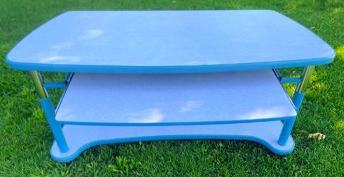 DESK- 5ft X  2ft in-depth (Adjustable to different heights. There’s caster wheels at bottom for easy mobility