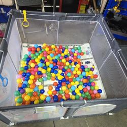 Playpen With Colorful Balls 