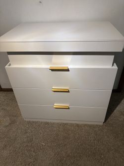 Dresser with charging station