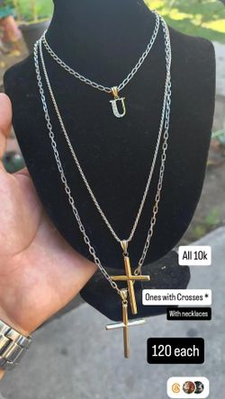 10k gold cross pendant and "u"