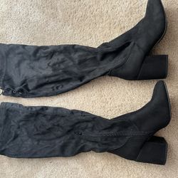 Woman’s High Knee Heels