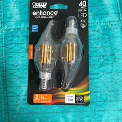  vintage oval-shaped wicker basket with a green and natural rattan weave. 