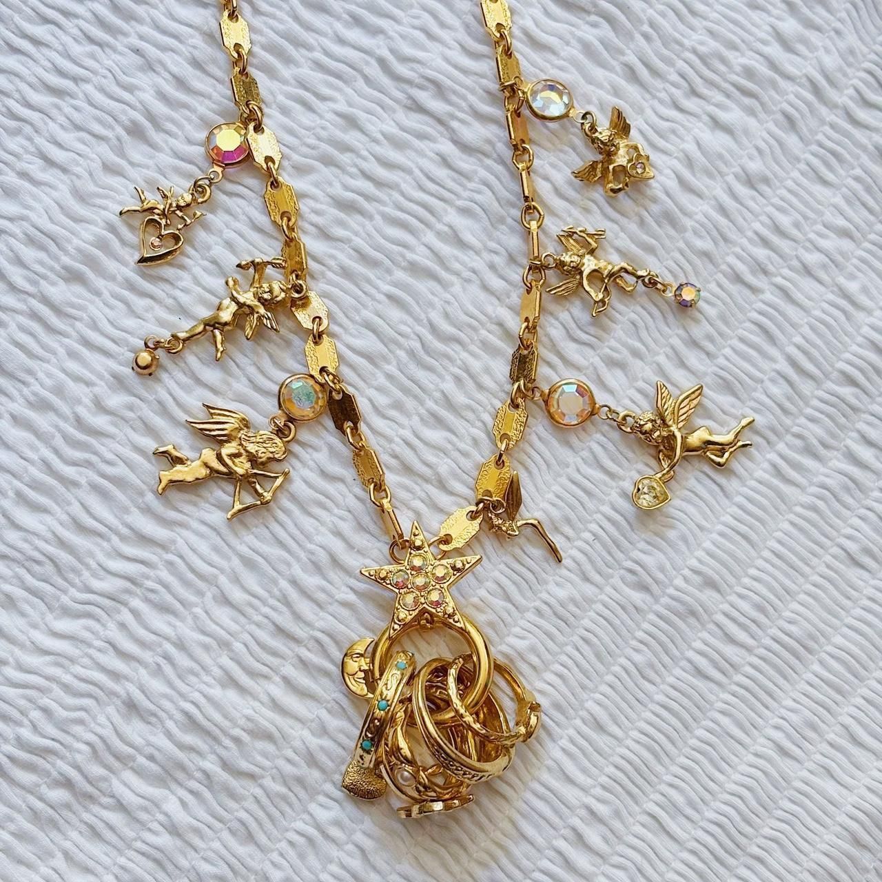 vintage gold kirk’s folly charm necklace with rings. seven beautiful gold angels and cherub charms, an amazing detailed celestial ring（28）38