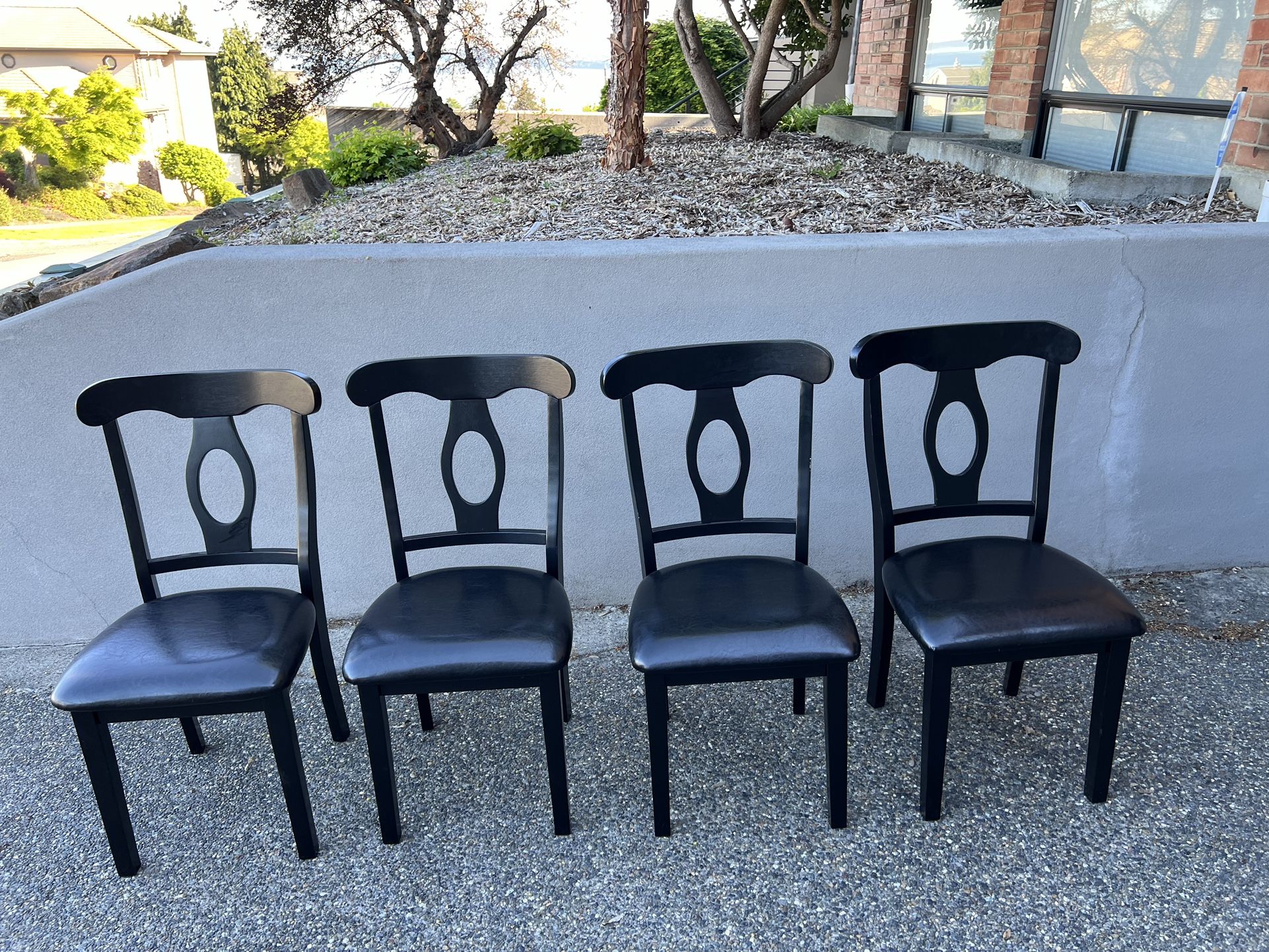 Four Dining Chairs - $100