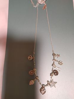 Cute silver-colored charm necklace, 16 inches long