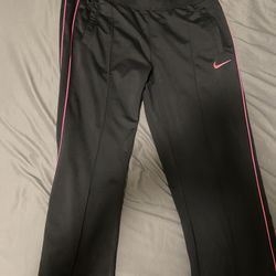 Pink Nike track pants