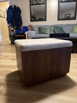 Ottoman with compartments inside and rolling wheels