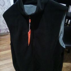 Heated Vest That Uses USB Cord. To Heat. It Will Heat Your Hands While Wearing The Vest. It Heats The Vest Using A USB Cord..