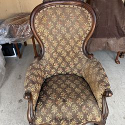 Antique upholstered Empire Back Arm Chair