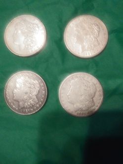 I have 4 1921 Morgan Silver dollars