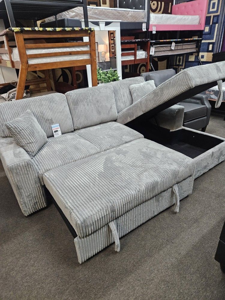 New sectional with pullobed and storage $899