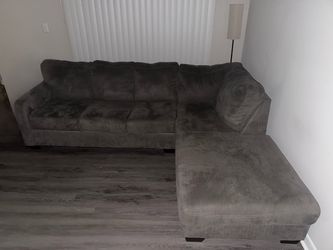 Gray two-piece sectional couch