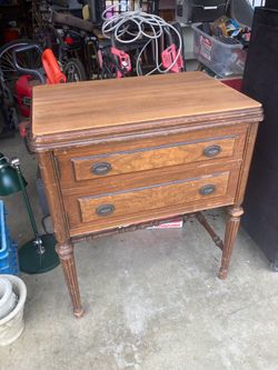 Vintage sewing machine cabinet