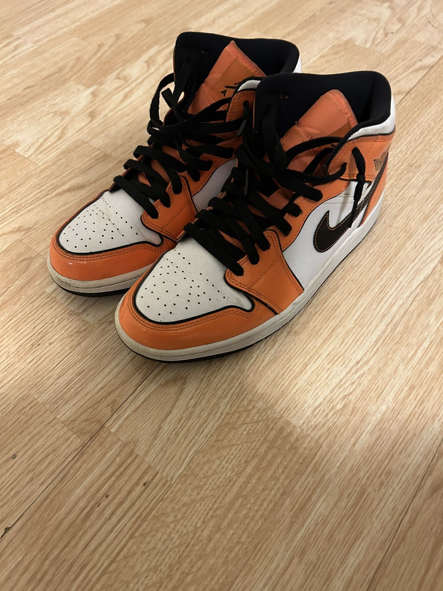 Air Jordan 1s Mid Turf Orange