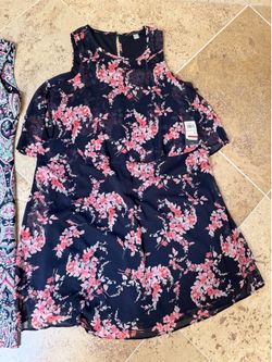 2 new dresses- $15
