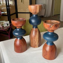 3 wooden candlesticks