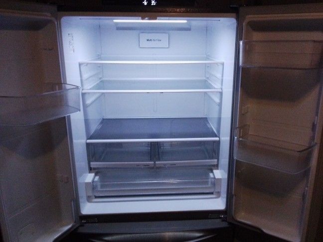 Stainless Steel LG Refrigerator With French Doors And Bottom Pull Out Freezer Drawer 