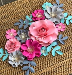 Paper flowers and name cutouts