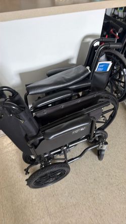 Black Folding Wheelchair with Padded Armrests