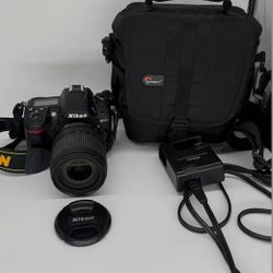 Nikon d7000 dslr + 18-105mm lens + accessories – ready to sh