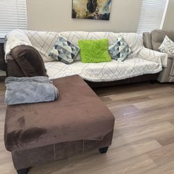 Nice Couch Sectional Brown With Covers On