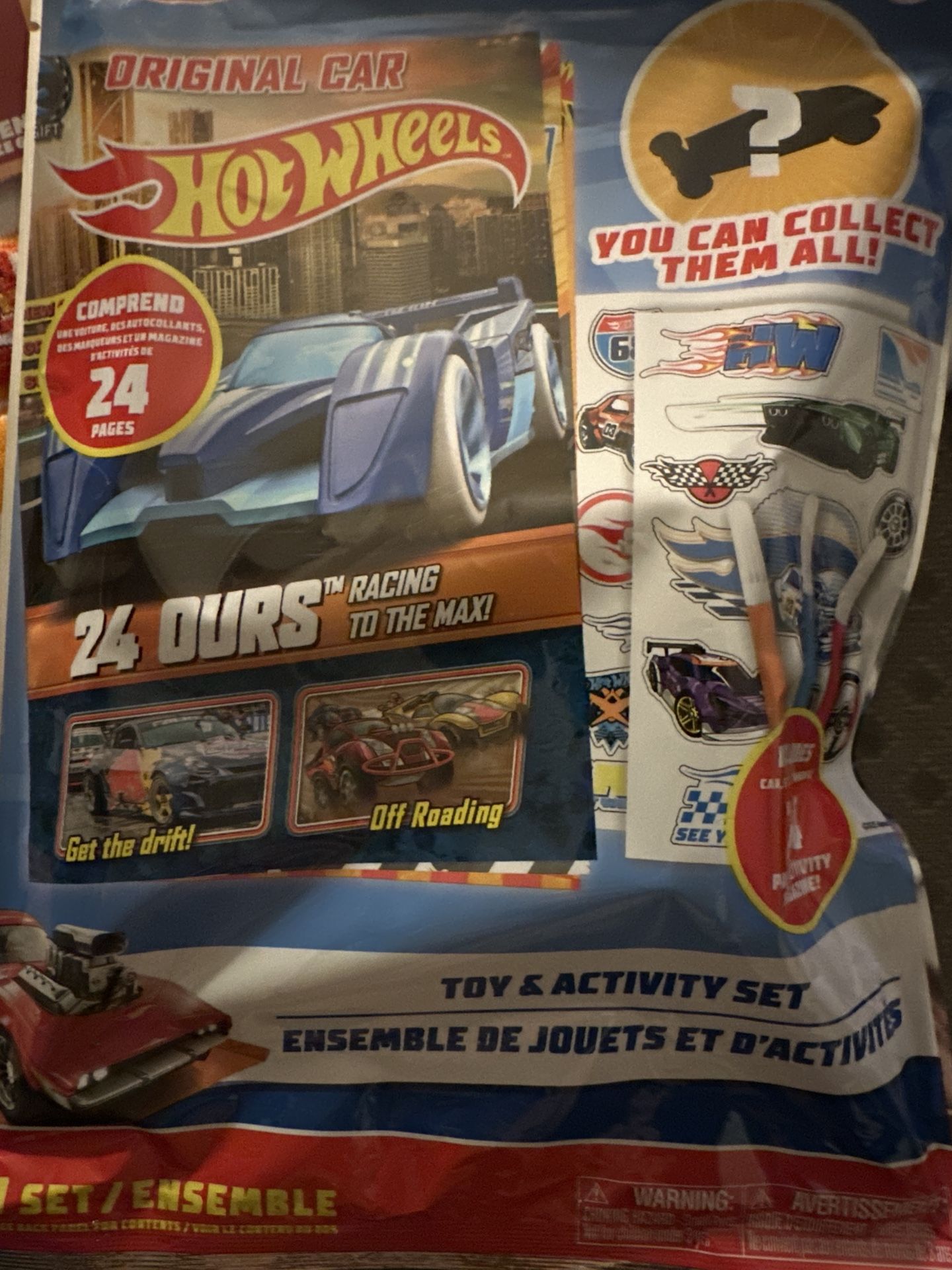I'm selling a brand new Hot Wheels Toy & Activity Set! This set includes a 24-page activity magazine, 1 vehicle, 2 sticker sheets, and 3 mini markers.