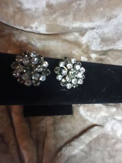 Vintage large clip earrings. 1950's. Assembled in a Starburst Rivet design.