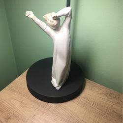 Lladro Boy yawning 