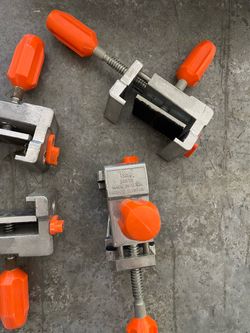 Cabinet clamps and cabinet pull guide