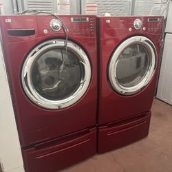 Lg  Washer And Electric Dryer W/pedestal Used