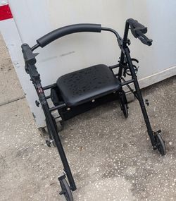 Walker With Storage Seat & Cup Holder