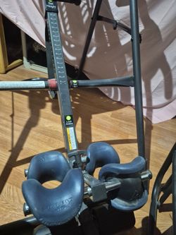 Teeter upper and lower back strengthening