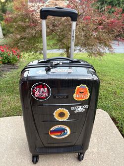 Carry on hard shell spinner luggage. Great quality and brand, Samsonite.